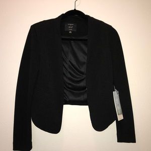 Women’s dressy blazer.
